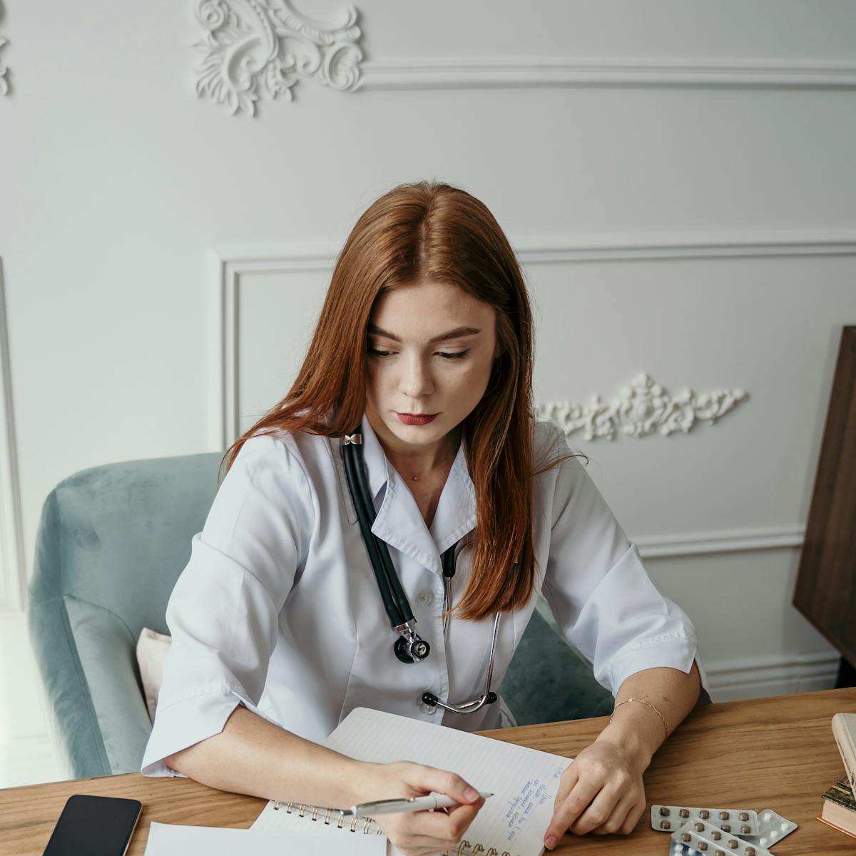Clinician working at a modern desk